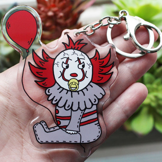Baby Pennywise The Clown with his red balloon and pacifier horror parody keychain by SpookyKillerBabies.com
