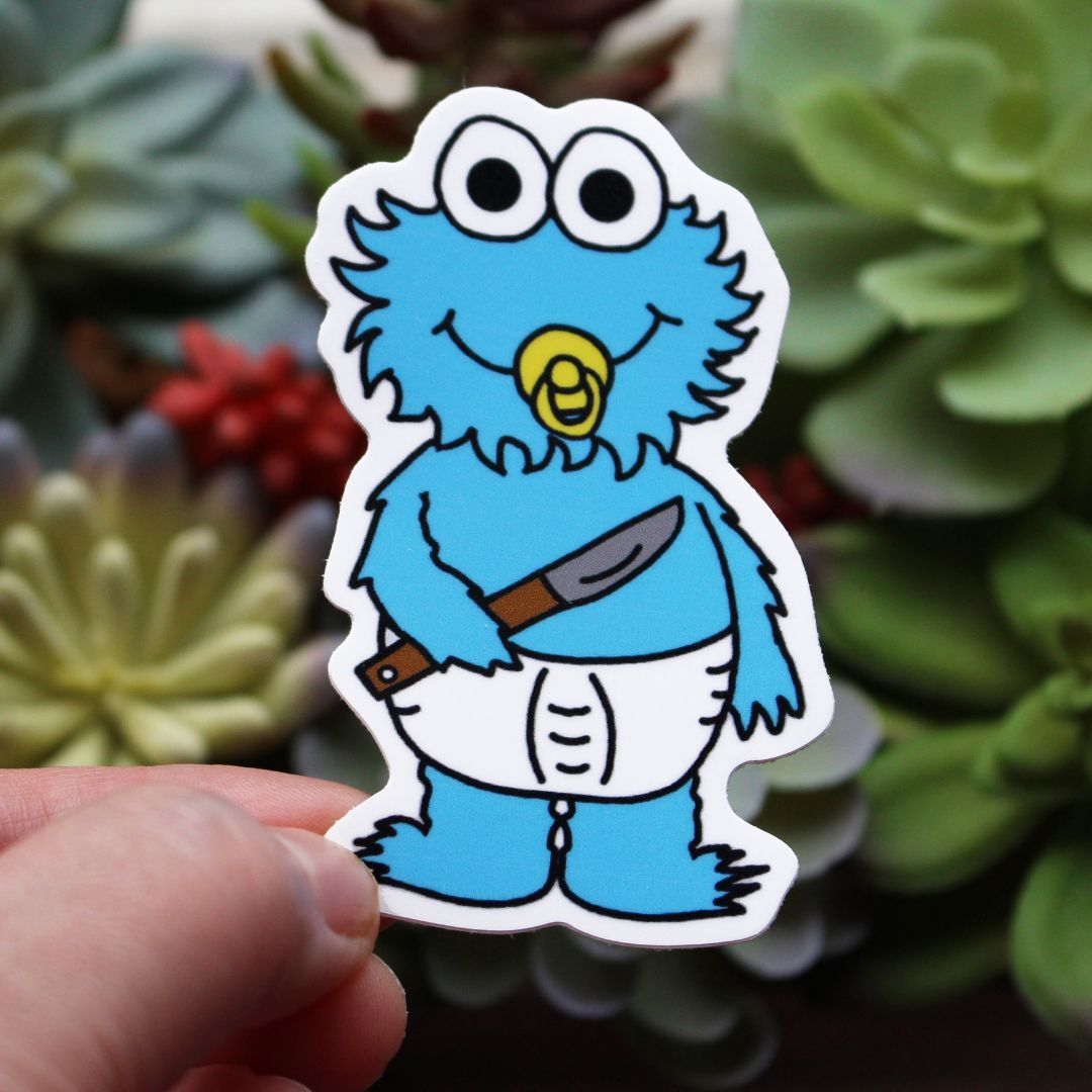 Baby cookie monster wearing a diaper holding a knife sucking a pacifier horror parody sticker by SpookyKillerBabies.com